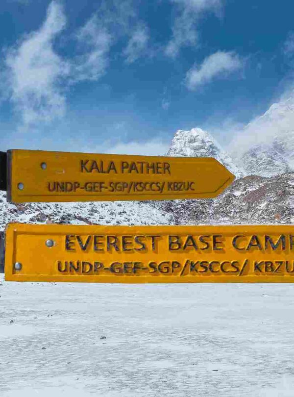 Wooden Signpost Indicating the Way to Everest Base Camp and the Summit of Kala Patthar